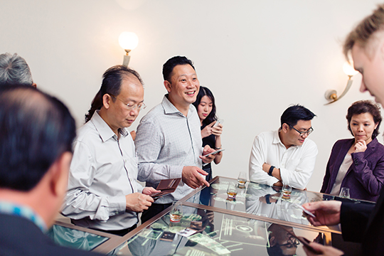 Guests interacting with Asia's first tactile multi-touch table